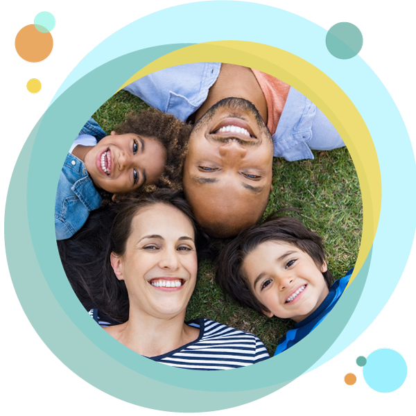 Family relaxing in the grass